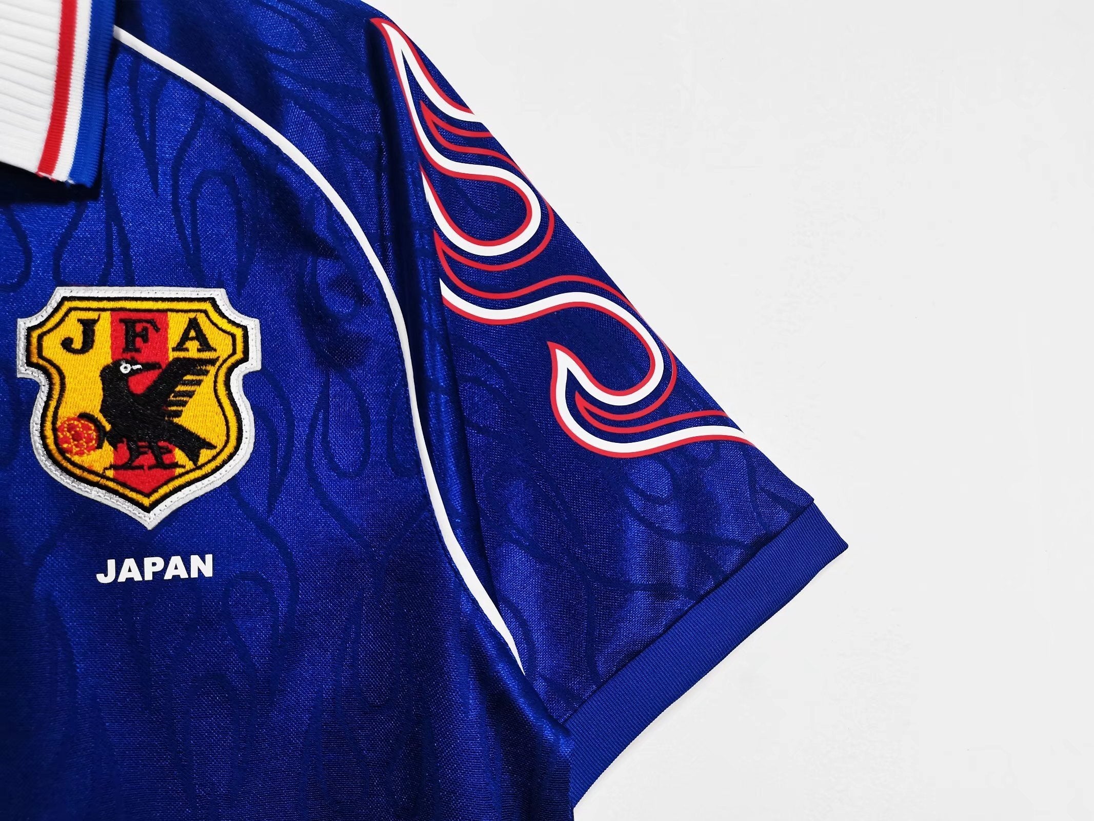 1998 Japan Home: The "Great Wave" Flame Icon